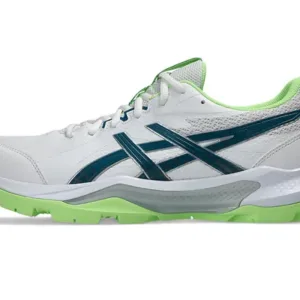 Asics Gel Peake 3 cricket shoe in white and navy, highlighting the dimpled rubber sole and reinforced toe area.