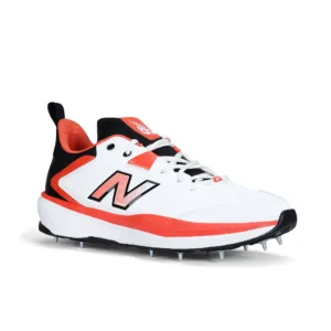 New Balance CK4030F6 in White/Red/Black colorway, showing the 11-spike metal outsole and FuelCell midsole branding.