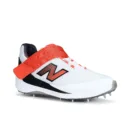 New Balance CK4040F7 in White/Red, showing the mid-cut ankle support, Velcro strap, and 11-spike metal outsole.